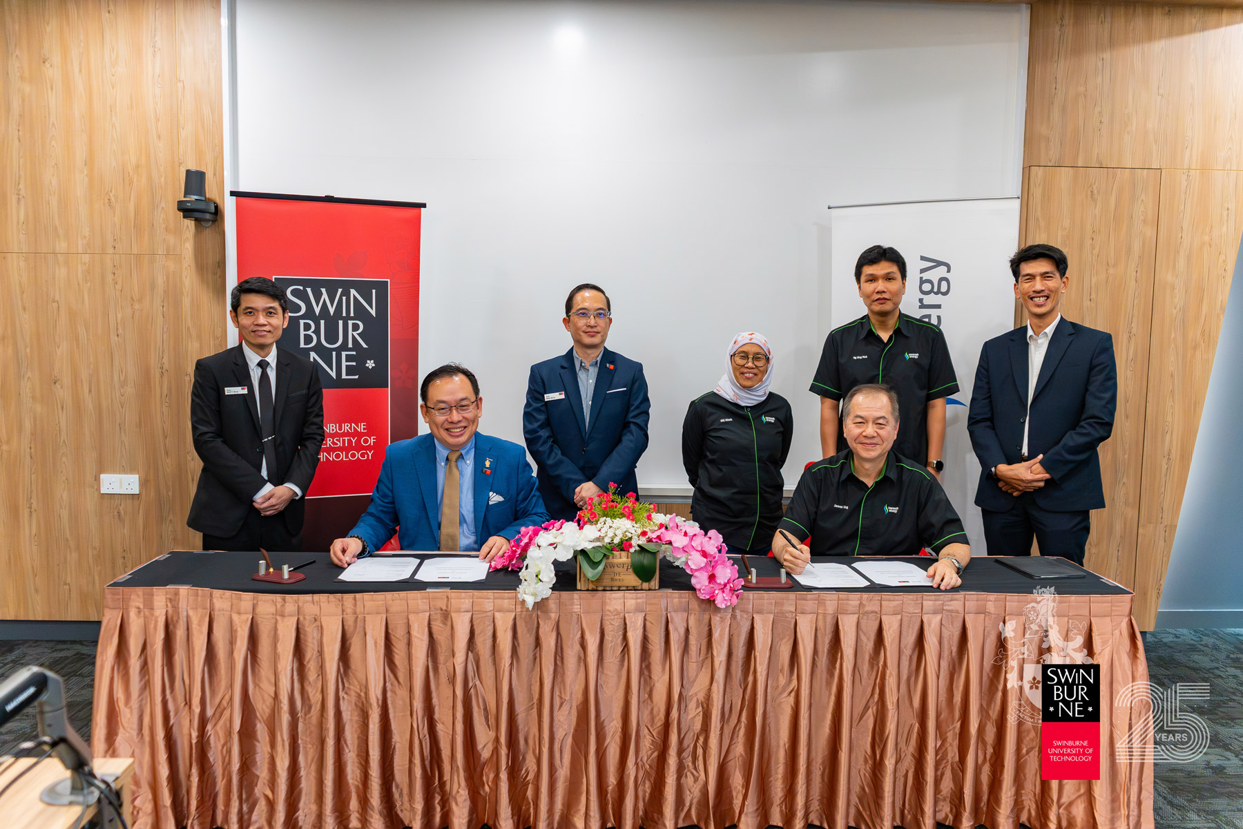 Ir Professor Lau Hieng Ho (seated left) and Ir James Ung (seated right) sign the MoU at the ceremony.
